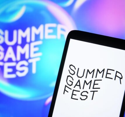 a Summer Game Fest logo on a phone and the wall to represent the day and place Mafia: The Old Country got announced