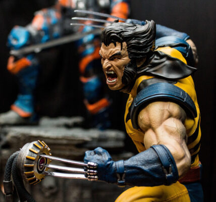 a Wolverine action figure in an aggressive pose in his famous yellow and black outfit