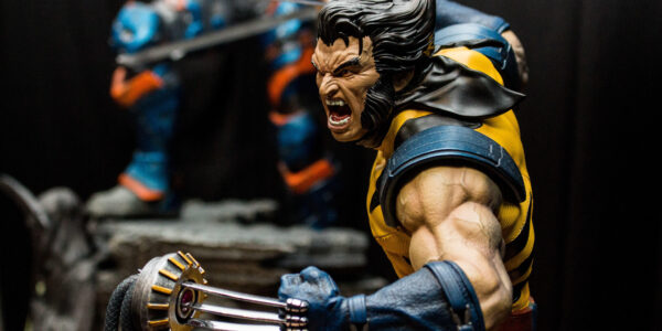 a Wolverine action figure in an aggressive pose in his famous yellow and black outfit
